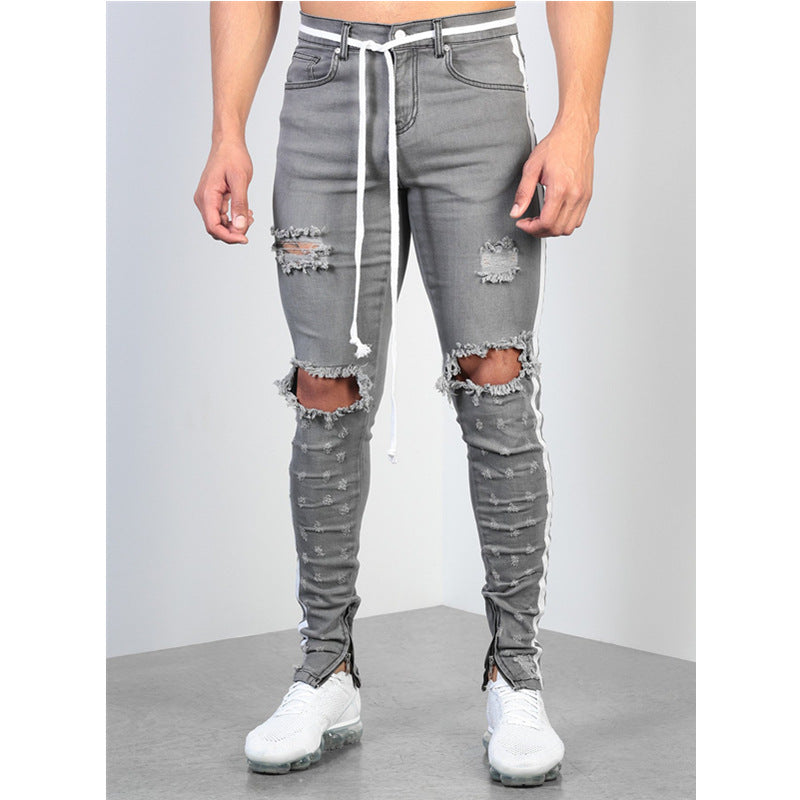 Ripped Denim Jeans with Zipper Detail and Knee Holes