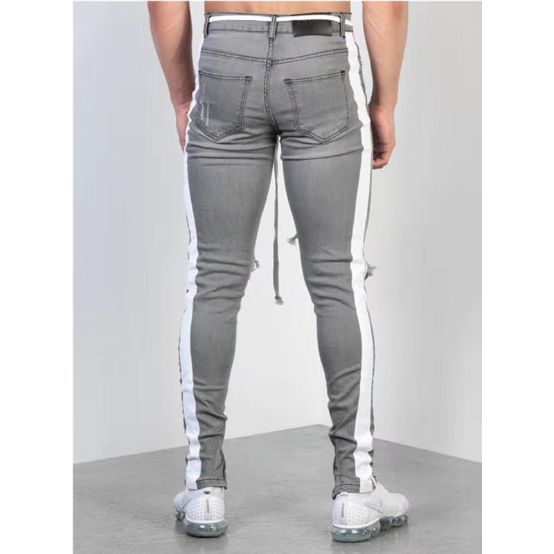 Ripped Denim Jeans with Zipper Detail and Knee Holes